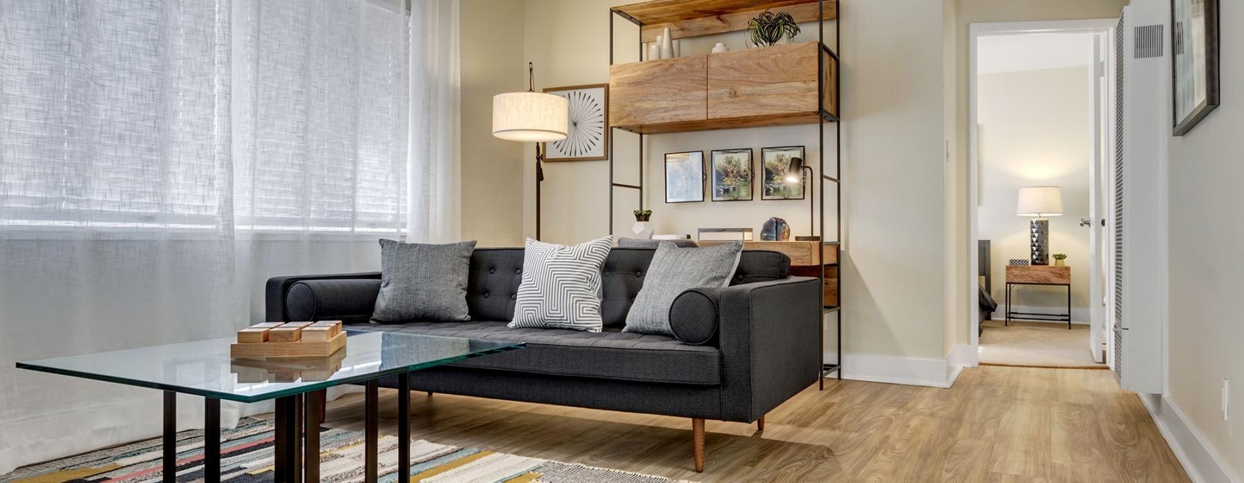 a living room with a couch and a table