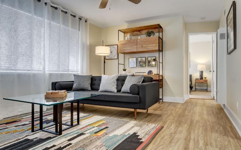a living room with a couch and a table